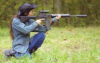 Pretty woman with AR18