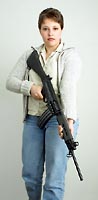 Julie with a rifle