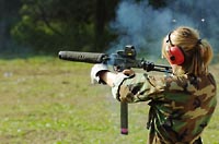 Young girl with a Mac10