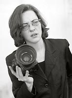 Buy a camera rather than makeup, a handgun rather than trendyclothes and spend time shooting rather than primping